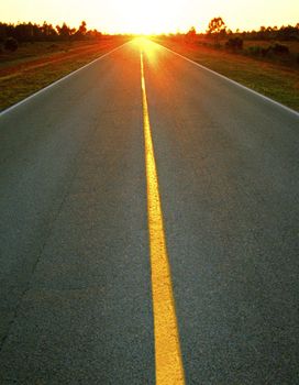 Open Road Leading into Beautiful Sunset