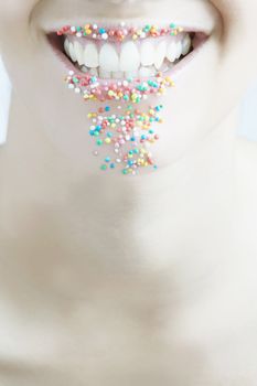 Person with Candy-Coated Mouth