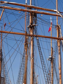 Traditional sailing group of vintage wooden sailboats tallships