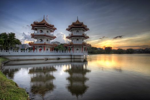 Twin Pagodas at Singapore Chinese Garden Lake at Sunset