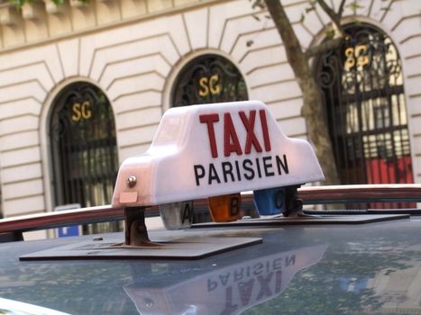 Close-up of the label of a parisian Taxi