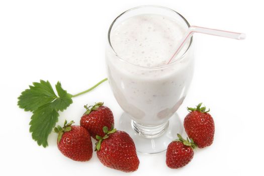 Milkshake with fresh strawberries over white background