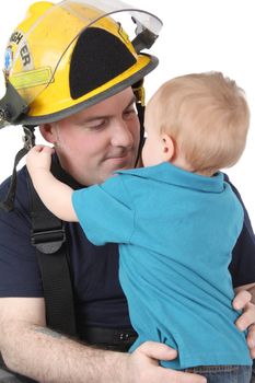 Toddler son of a fireman looking at him 
