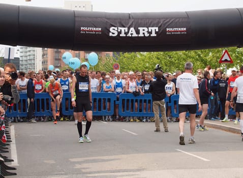 COPENHAGEN - MAY 21: More than 12,000 runners from 40 countries participate in the yearly Copenhagen Marathon. It covers a 42- kilometre route mostly within the city centre in Copenhagen, Denmark.