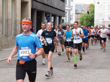 COPENHAGEN - MAY 21: More than 12,000 runners from 40 countries participate in the yearly Copenhagen Marathon. It covers a 42- kilometre route mostly within the city centre in Copenhagen, Denmark.