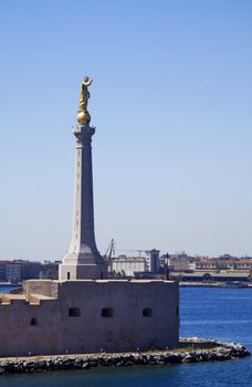 Sicily arrival with the tall statue at the front of the port