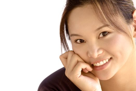 It is a portrait of beautiful eastern young lady smiling