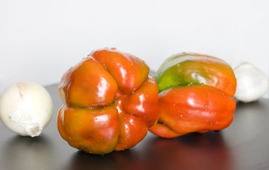 Still life of peppers and garlic