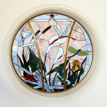 Stained glass window. Floral design.
