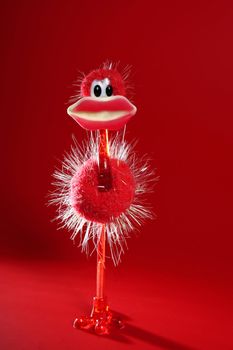 Funny red ostrich toy with big candy hot lips