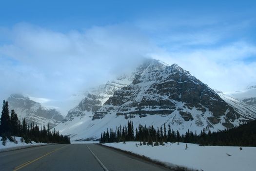Quiet road through the Rockies in Banff National Park, Alberta Canada