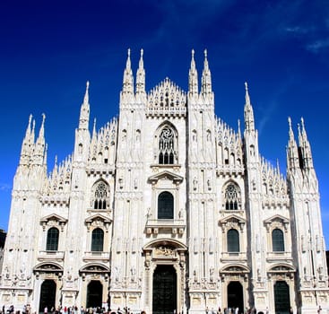 Facade of Duomo in Milan on blue sky