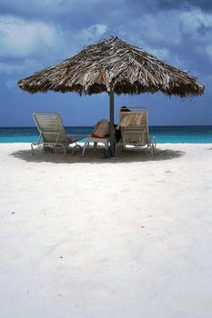 Relax on the beach under the sun, isle of Aruba, Dutch Caribbean.