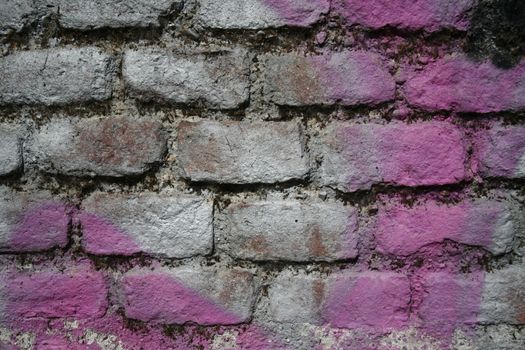 Colored stones on wall background, Milan.