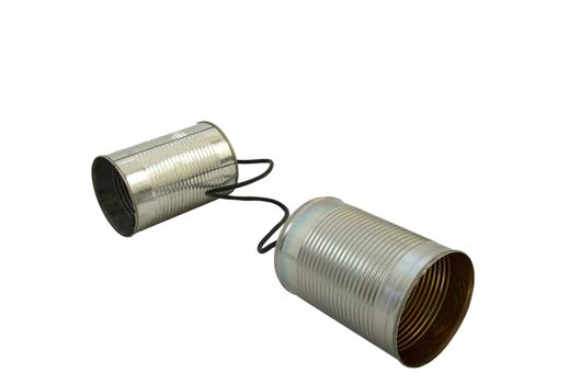 Two can attached to each other acting as a phone isolated on a white background