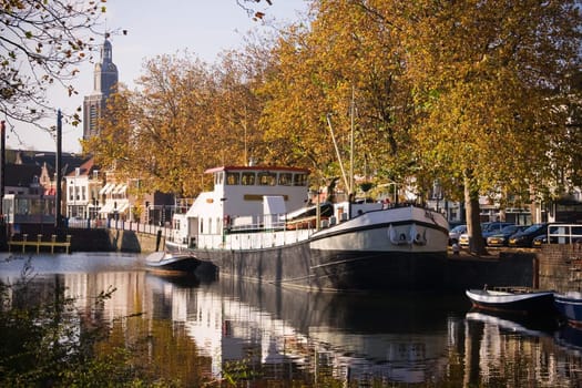 Ship in harbour in autumn on sunny october day