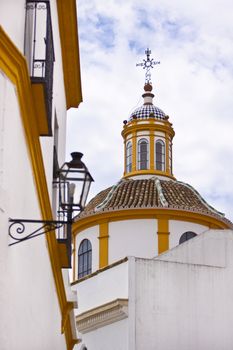 Street in Sevilla colored in the typical white and yellow
