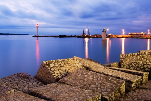 Image shows the entrance of the Vieux Port in the city of Cannes, French Riviera