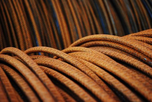 Rusty steel cable on a coil.