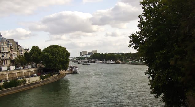 View of the Seine by a bridge in Paris