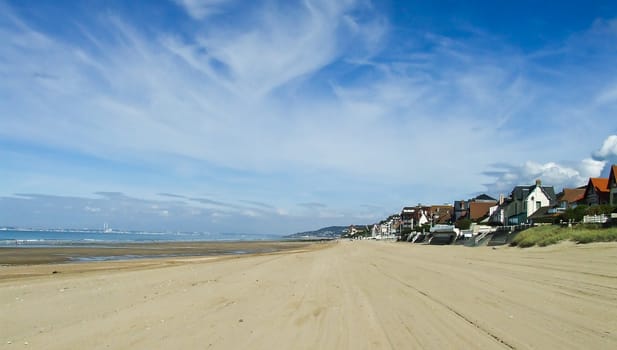 View of Juno beach, sand between sky and ocean