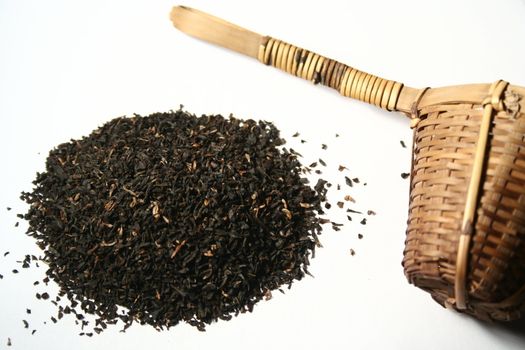 Black tea on white background