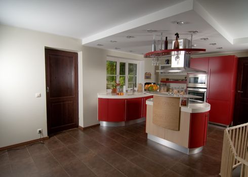 Shot of beautiful red modern kitchen, interior