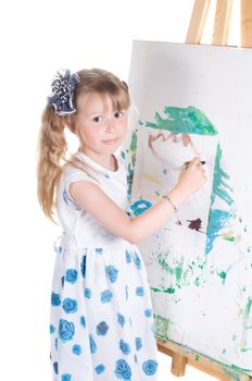 Shot of little girl painting in studio