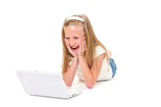 Little girl with laptop on white background isolated