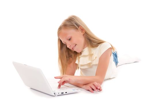 Little girl with laptop on white background isolated