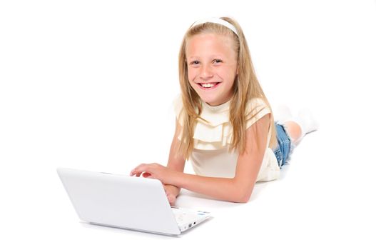 Little girl with laptop on white background isolated