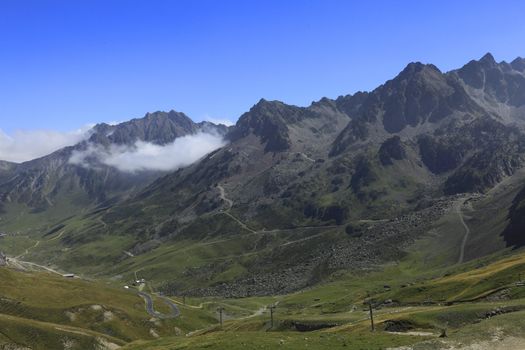 Landscape in Pyrenees Mountains as it could be seen from Col du Tourmalet.You can see segments of the road to this point, which is one of the most famous cycling climbing route in the world.