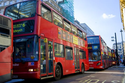 Red two-storeyed buses - one of symbols of London 