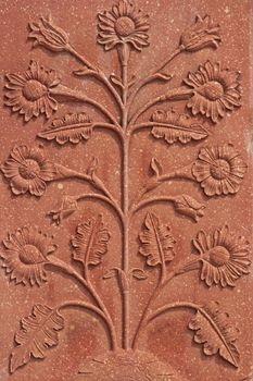 Detail of decoration on the mosque at the Taj Mahal. Mughal style building of red sandstone inlaid with marble. Agra, Uttar Pradesh, India