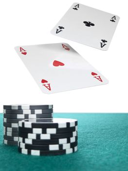 Two aces flying over a stack of chips on the poker table.