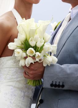 Wedding bouquet from tulips and callas