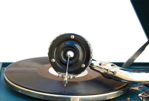 Antique old player (gramophone) isolated on a white background