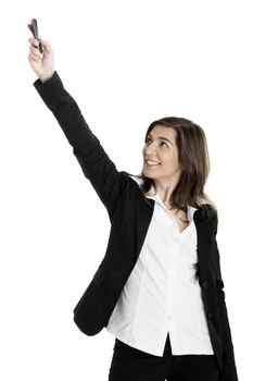 Portrait of a young beautiful businesswoman tryng to have Phone signal