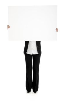 Portrait of a woman holding a blank billboard in front of her