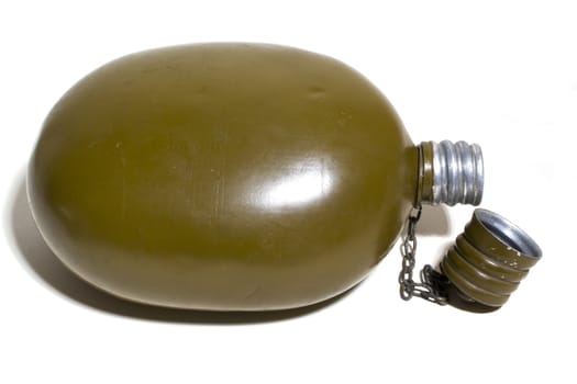 soldier's old flask on a white background and by the unscrewed lid