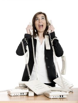 Busy woman working and answering a lot of calls at the same time