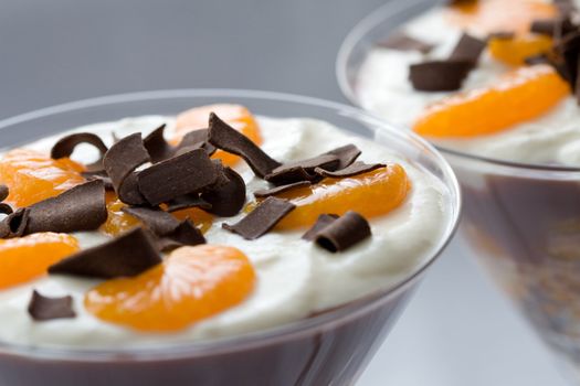 Delicious dessert topped with chocolate sprinkles and little mandarin bits