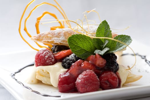  Delicious pastry dessert filled with fruit served on a plate