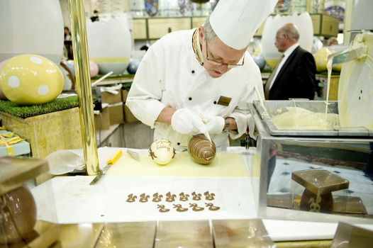 The confectioner makes easter chocolate eggs, taken in London on April 2011