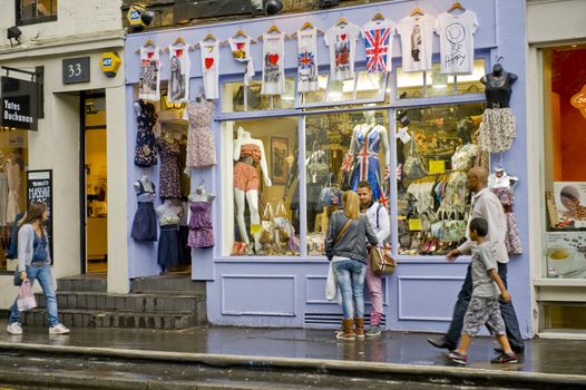 Tourists in the street London do shopping 