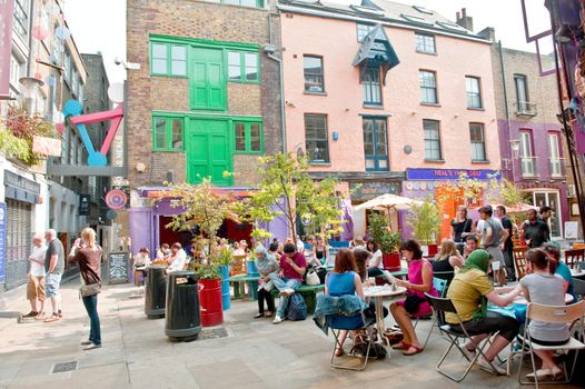 Summer cafe in one of court yard of London 