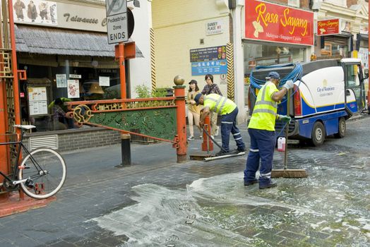 The klining service washes one of streets of London 