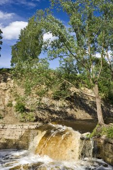 Fleeting water of a boisterous waterfall
