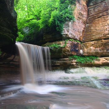 Spring rains create a beautiful scene at Lasalle Falls of Starved Rock State Park in central Illinois.