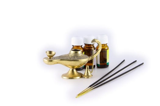 Accessories to a relaxation, aromatic sticks, oils and a lamp